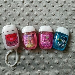 4 antibacterial hand sanitizers and holder